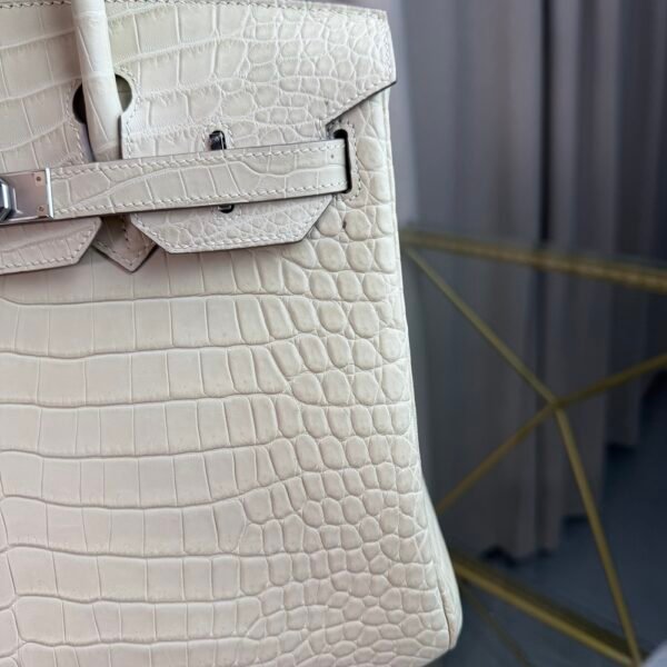 Glacier White Matte Alligator Birkin 30 Bag Front view of a luxury Birkin 30 bag in Glacier White matte Alligator leather with palladium hardware.