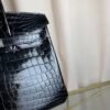 Black Shiny Niloticus Crocodile Birkin 30 Bag Front view of a luxury Birkin 30 bag in Black shiny Niloticus crocodile leather with palladium hardware.