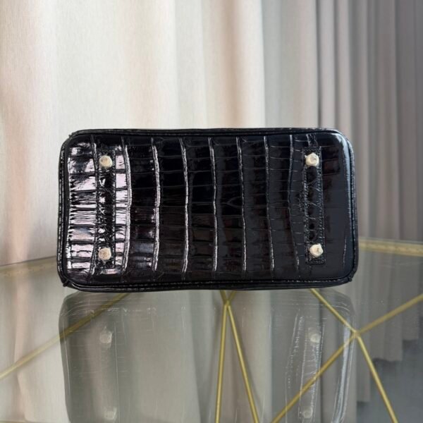 Black Shiny Niloticus Crocodile Birkin 30 Bag Front view of a luxury Birkin 30 bag in Black shiny Niloticus crocodile leather with palladium hardware.