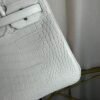 Blanc Matte Alligator Birkin 30 Bag Front view of a luxury Birkin 30 bag in Blanc matte Alligator leather with palladium hardware.
