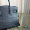 Black Matte Niloticus Crocodile Birkin 30 Bag Front view of a luxury Birkin 30 bag in Black matte Niloticus crocodile leather with palladium hardware.
