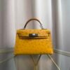 Kelly Sellier 20 Style Jaune Ambre Ostrich Palladium Hardware