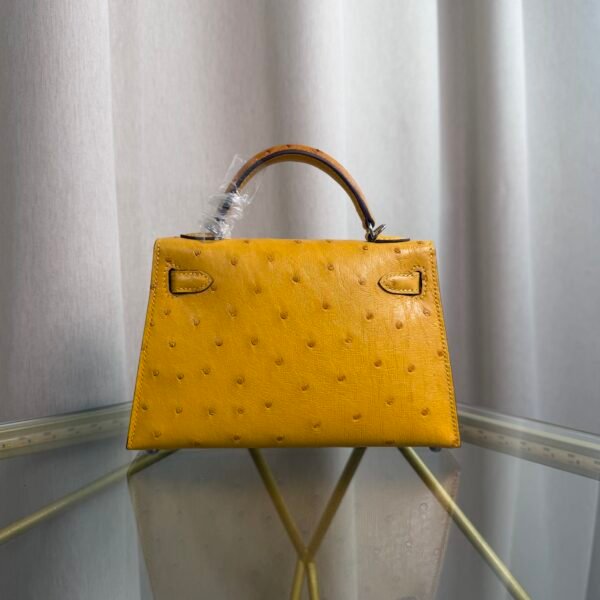 Kelly Sellier 20 Style Jaune Ambre Ostrich Palladium Hardware